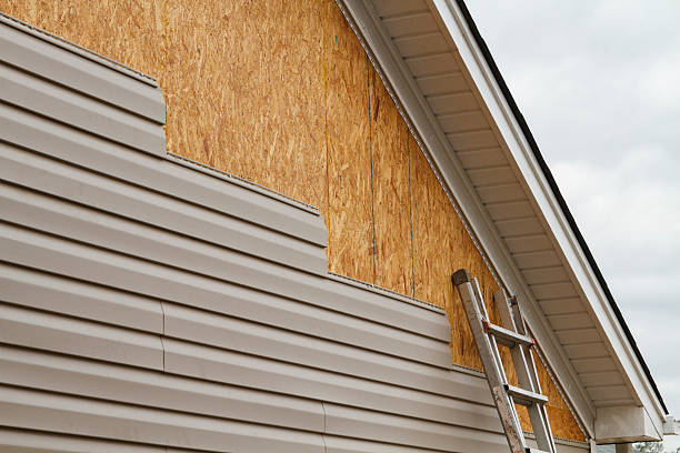 Professional Siding Repair technician working in Columbia Station, OH